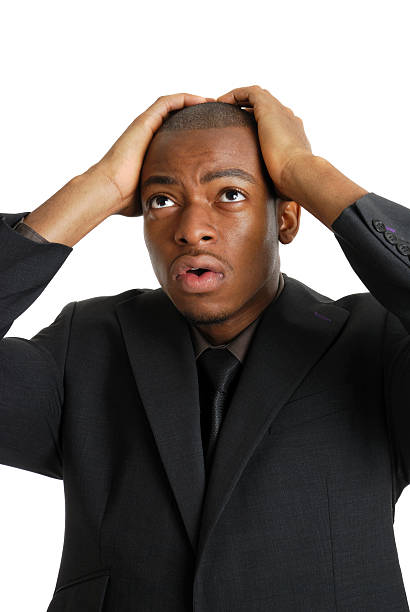 istock Business man with his hands on head due to failure 151519559