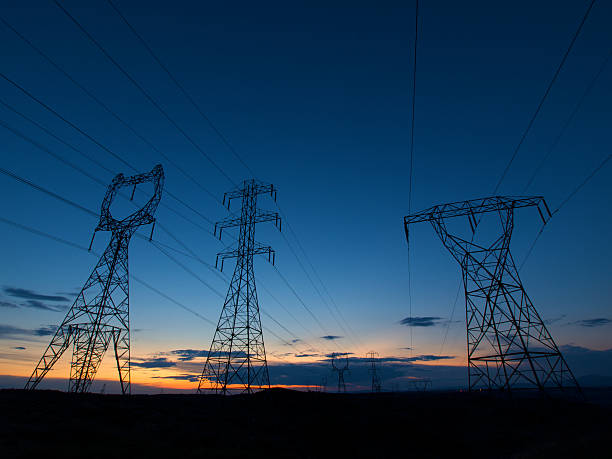 istock Rows of Electrical Power Lines During Sunset 151520841