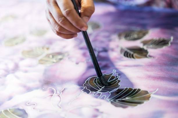 Malaysian Batik Painting. Malaysian traditional batik painting process. malaysia batik pattern stock pictures, royalty-free photos & images