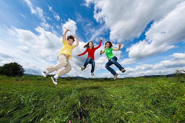 istock Active family jumping outdoor 151521846