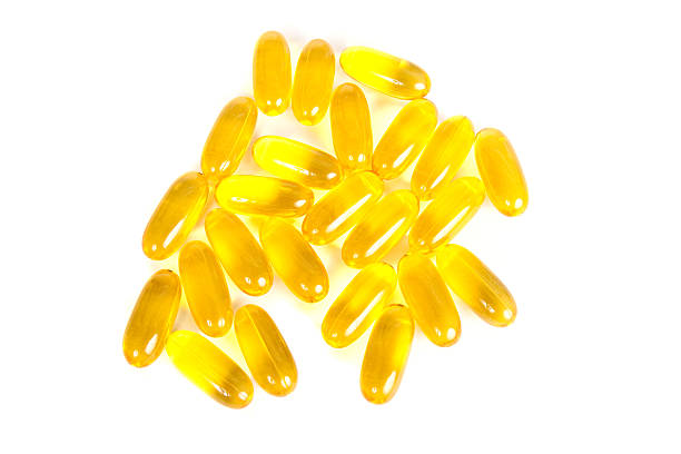 istock Yellow Gel Caps on White 151523053