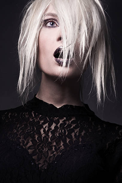 istock Young woman-witch in vampire look 151523881