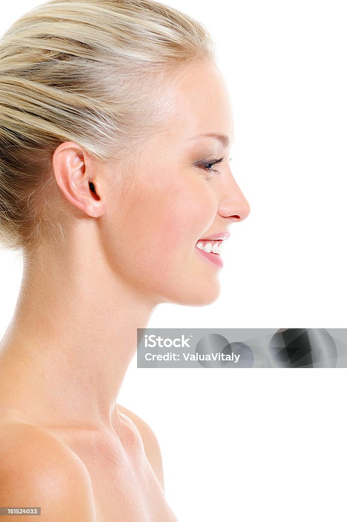 Profile face of beautiful laughing  woman Profile face of beautiful laughing young woman - isolated Profile View Stock Photo