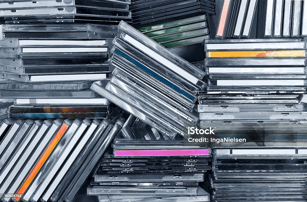 CDs in shelf Piles of CDs in a shelf. Compact Disc Stock Photo