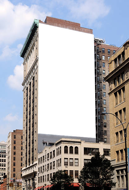 Large blank billboard on the side of a city building Large Billboard in New York City. Clipping path included. billboard stock pictures, royalty-free photos & images