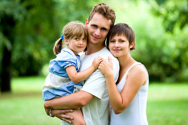 istock Young Family Bonding in Park 151527846