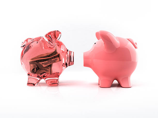 piggy bank with bill inside stock photo