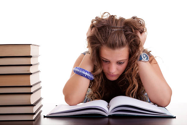 istock girl stressed because of  work on her desk,  pulling hair 151529065