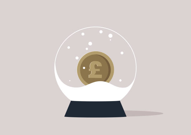 istock A crystal ball filled with artificial snow, a metal GBP coin inside 1515291010