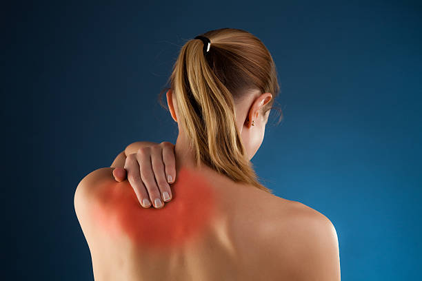 istock Woman massaging pain back 151529981