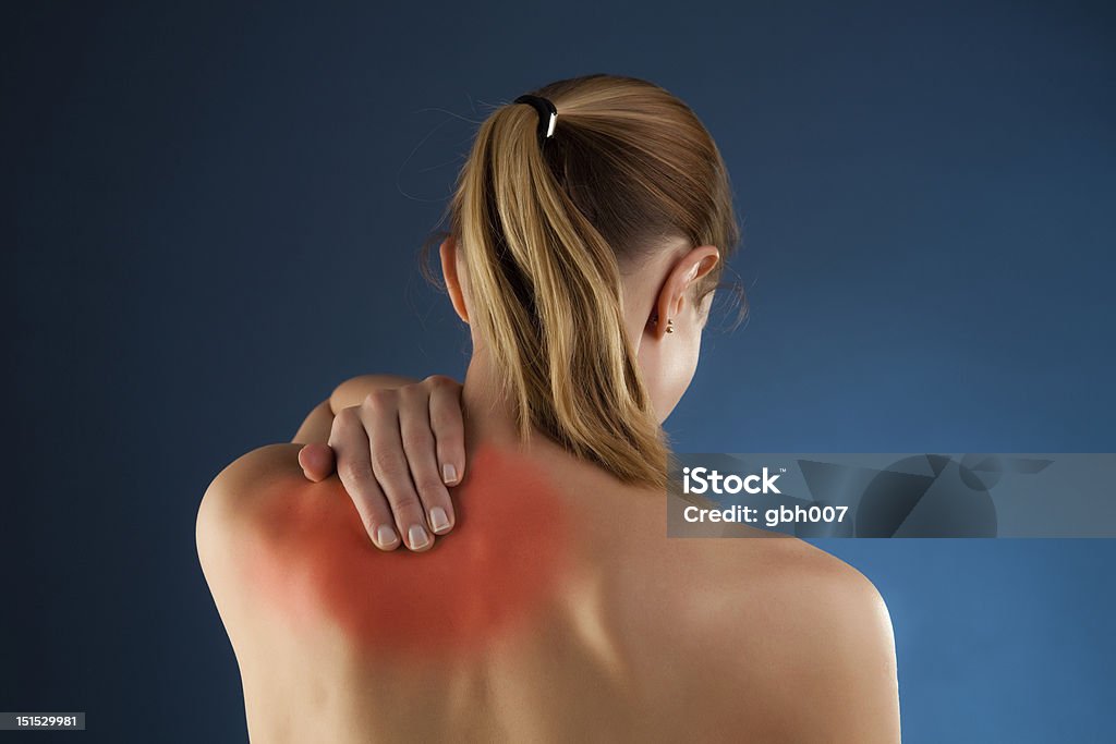 Woman massaging pain back Woman massaging pain back  Adult Stock Photo