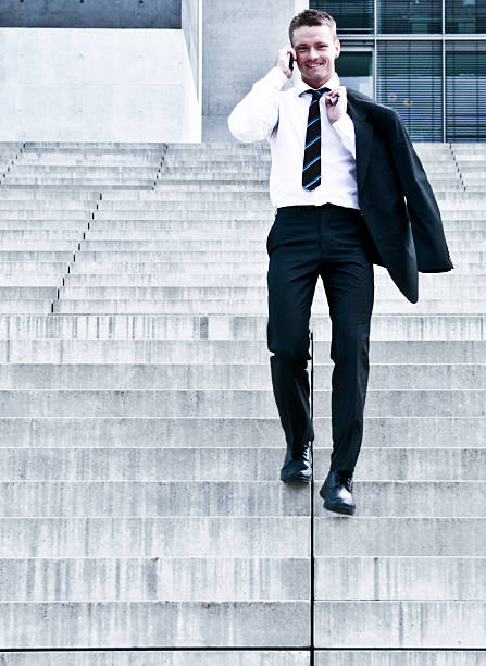 istock Young Corporate Man On Company Stairs 151530174