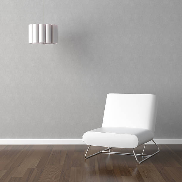 istock white chair and lamp on grey wall 151531435