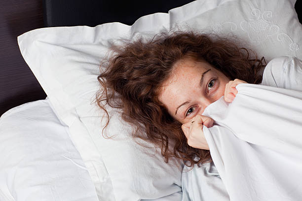 istock Smiling girl in the bed 151531888
