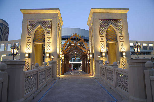 The Dubai Mall The Dubai Mall at dusk, Dubai, United Arab Emirates dubai mall stock pictures, royalty-free photos & images