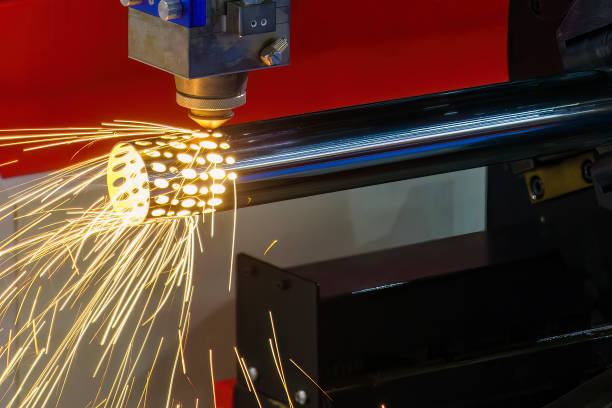 Close up scene the fiber laser cutting machine cutting  machine cut the stainless steel tube. stock photo