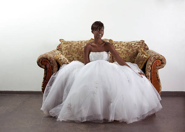 Young ethnic black woman bride in wedding dress stock photo