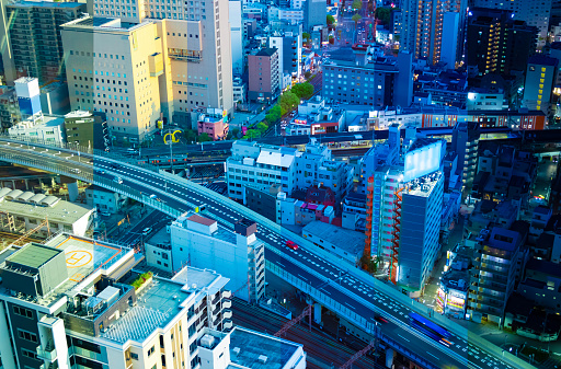 A sliced time lapse photography of panorama cityscape near the railway in Osaka telephoto shot. High quality photo. Asahi district Osaka Japan 04.10.2023 Here is near Takarazuka railway in Osaka.