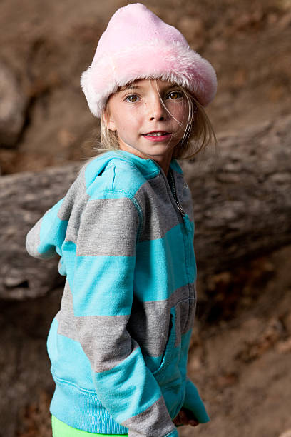 istock young girl in pink hat 151537330