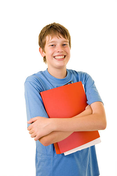 Young smiling student with colorful books stock photo