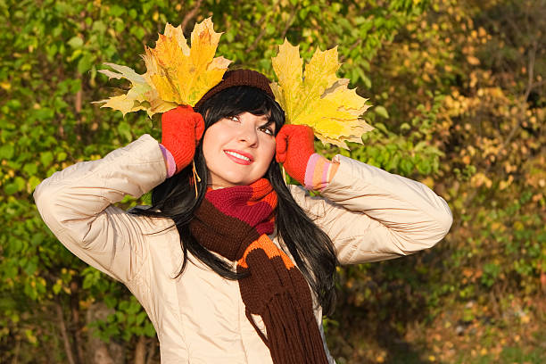 istock Young pretty woman on the autumn leaf 151539661