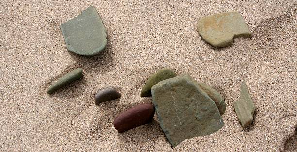 istock Pebbles in the sand 151539851