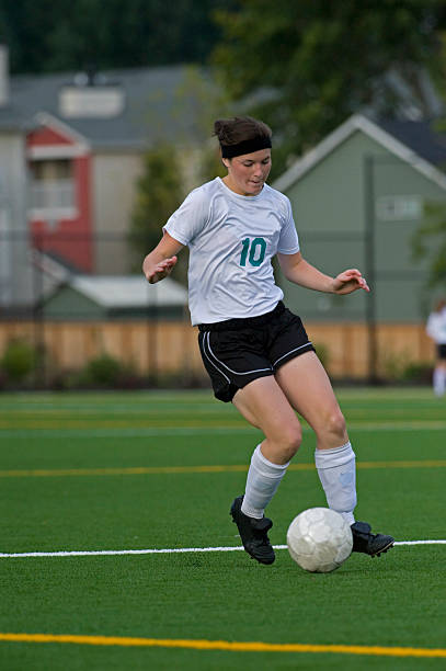 istock Soccer player moving the ball 151540789