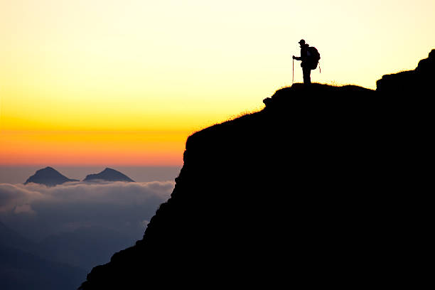 istock sunrise tirol mountains mountaineer silhouette 151540952