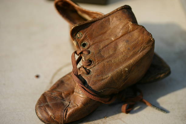 istock Old Leather Baby Shoes 151541385
