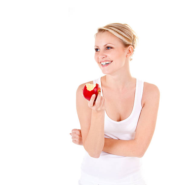 Young woman and apple stock photo