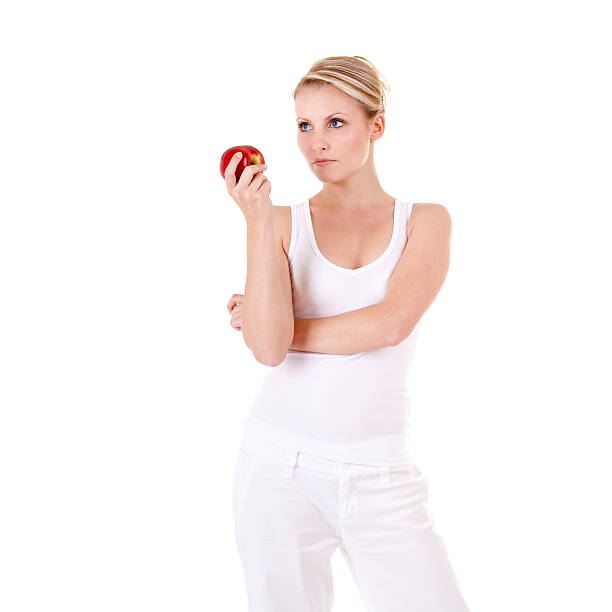 Young woman and apple stock photo