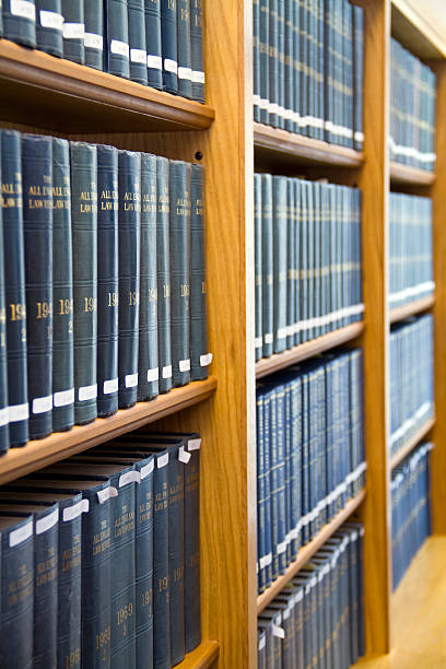 istock Blue Law Books stacked on the Bookshelf 151542637