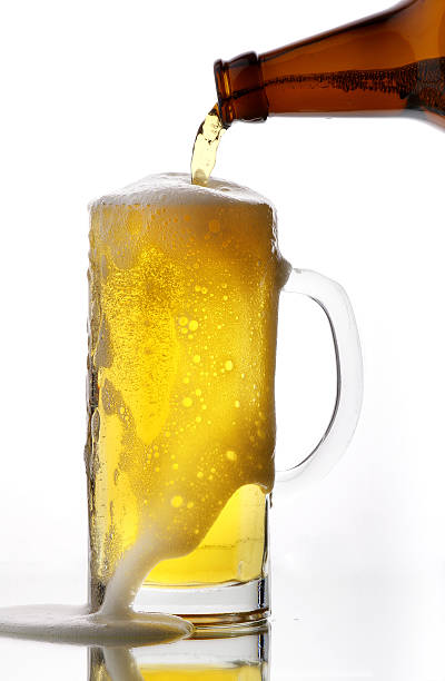 Glass with beer. A bottle. stock photo