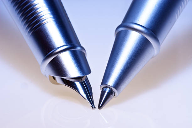 istock Pen and ballpointpen face off 151545148