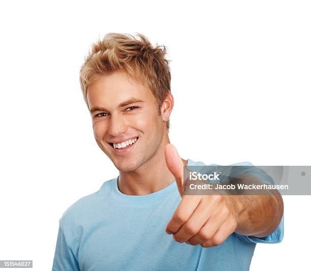 Happy Young Guy Mostrando Pulgar Hacia Arriba Señales Foto de stock y más banco de imágenes de Pelo rubio