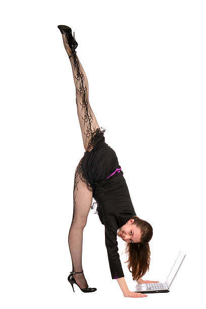 istock Girl in black suit bends forward to notebook. 151546349