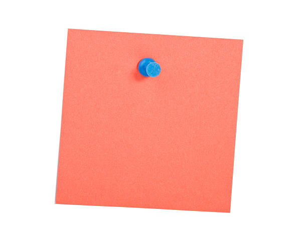 Red reminder note with blue pin stock photo