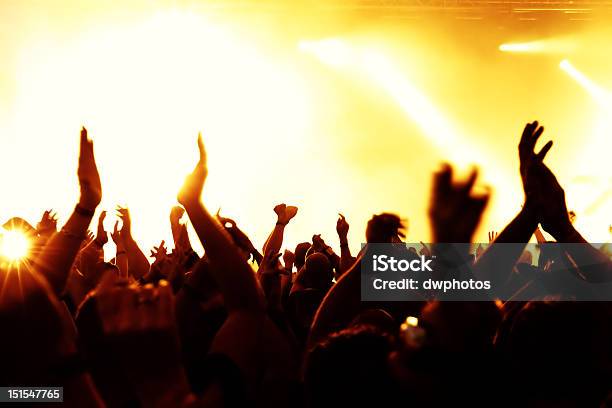 Silhouettes Of A Cheering Crowd Stock Photo - Download Image Now - Adolescence, Applauding, Arts Culture and Entertainment
