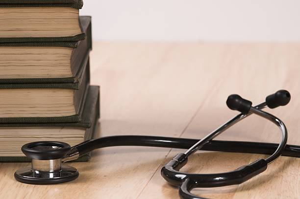 istock Stethoscope with medical books 151547929