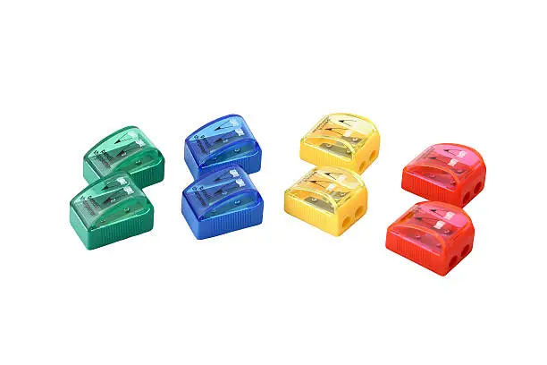 Group of  pencil-sharpeners in a lot of colors isolated on white background.
