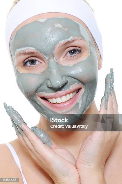 Woman Applying The Cosmetic Mask Stock Photo - Download Image Now - 20-29 Years, Adult, Adults Only