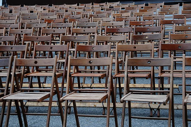 istock Rows of Empty Wooden Chairs 151549322