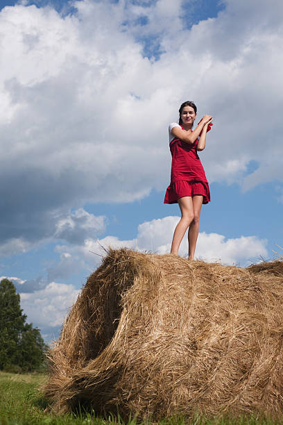 istock Haystack and the girl 151549485