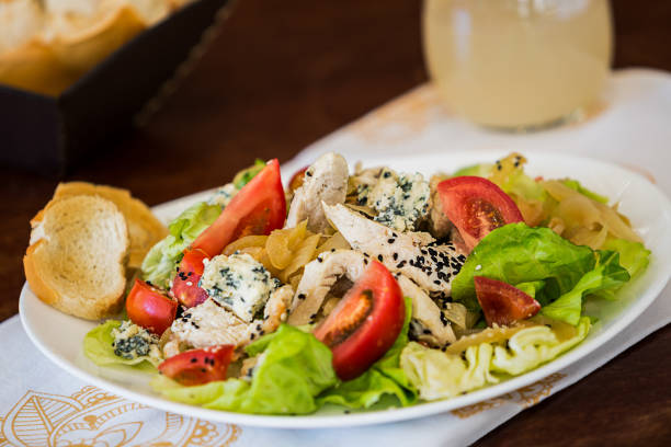 Grilled chicken salad, blue cheese, caramelized onion, lettuce, tomato and sesame seeds - buenos Aires - Argentina