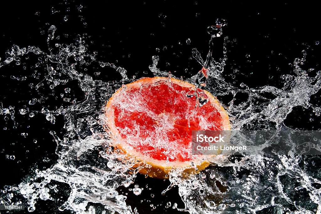 Explosion of juicy grapefruit Grapefruit Stock Photo