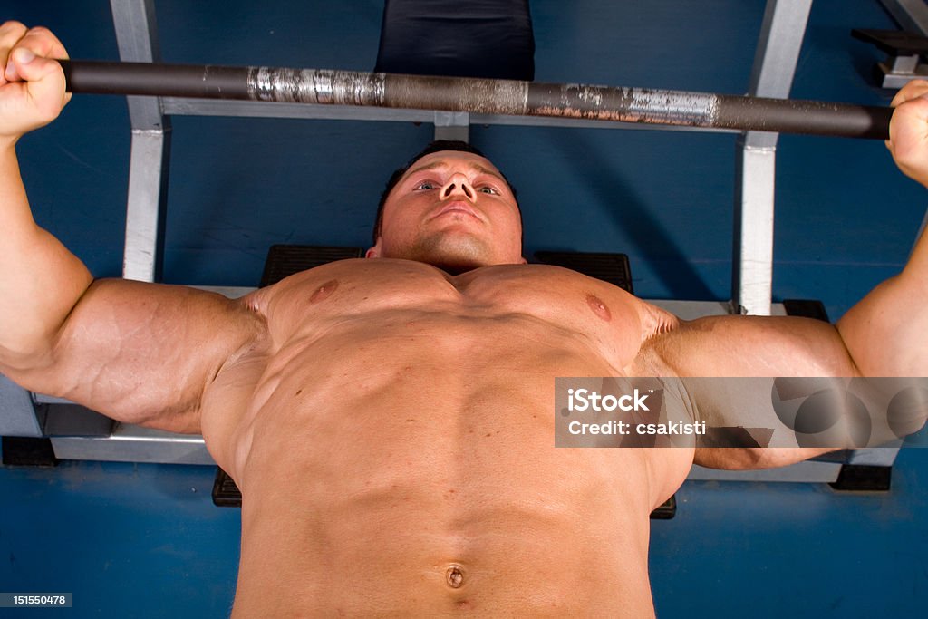 bodybuilder training bodybuilder training in the gym -bench press 25-29 Years Stock Photo