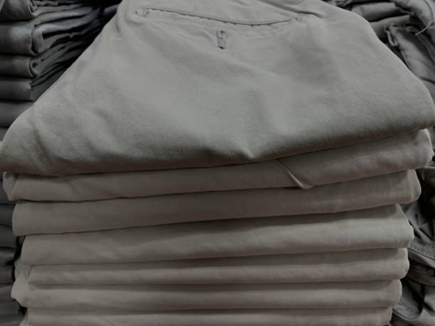 istock stack of chino pants trouser ind fashion store display 1515527221
