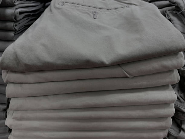 istock stack of chino pants trouser ind fashion store display 1515527232