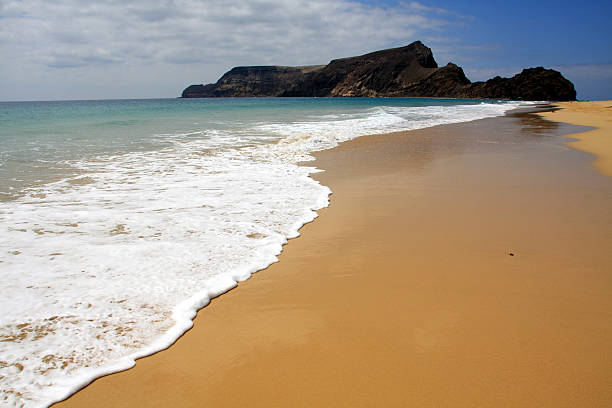 Calheta beach and Ilhéu de Baixo island stock photo