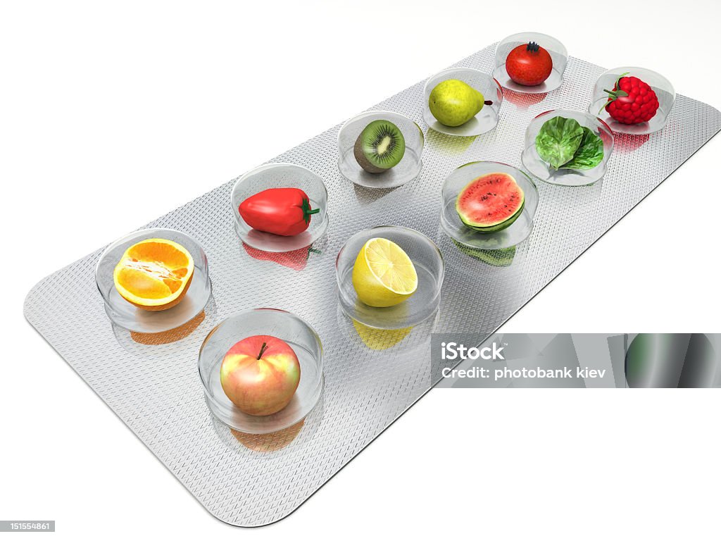 Vitamina pillole naturale - Foto stock royalty-free di Capsula